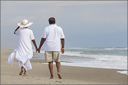 Couple walking on the beach