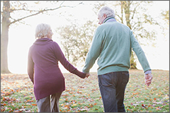 Elderly couple walking