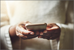 Woman checking cell phone