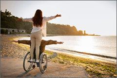 Couple on wheelchair by water