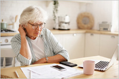 Elderly lady on devices