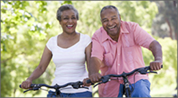 Senior couple on cycle ride in countryside