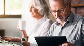 Elderly couple together at the kitchen