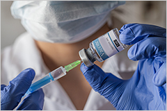 Nurse administering a vaccination