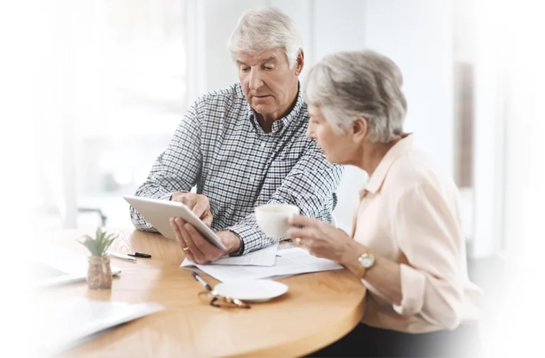 Senior couple reviewing documents